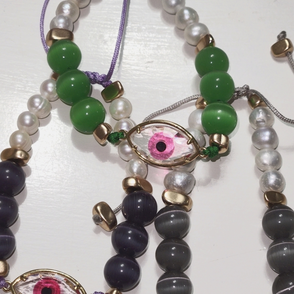 hand-woven bracelets made of natural stones with glass beads